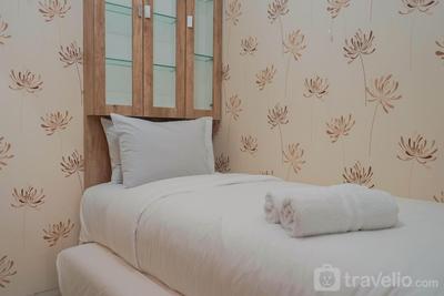 Best Furnished 2BR Mall Access at Green Pramuka City Apartment By Travelio