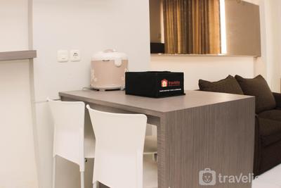 Homey and Tidy 2BR at Mutiara Bekasi Apartment By Travelio