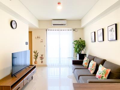 Spacious and Homey 2BR at Meikarta Apartment By Travelio