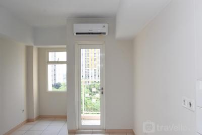 Unfurnished Studio with AC at 7th Floor Springlake Summarecon Apartment By Travelio