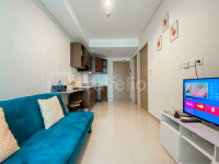 Comfort and Well Furnished 2BR Tamansari Iswara Apartment By Travelio