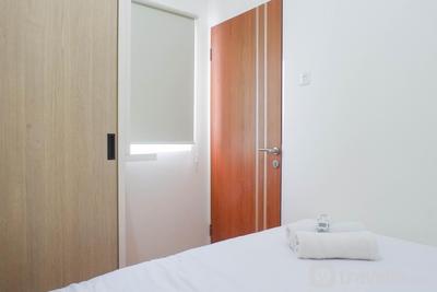 Apartemen Puncak Dharmahusada - Exquisite 2BR Apartment at Puncak Dharmahusada By Travelio