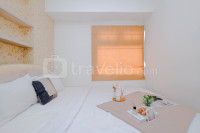 Strategic 2BR Apartment at Green Pramuka City By Travelio