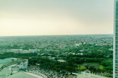 Apartemen U Residence - Cozy High Floor Studio Room Apartment at U Residence By Travelio