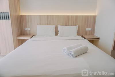 Homey and Warm Studio Amazana Serpong Apartment By Travelio