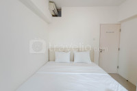 2BR Connected to Pakuwon Mall at Orchard Supermall Mansion Apartment By Travelio