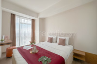 Ivory Nest 2BR At Grand Sungkono Lagoon Apartment By Travelio