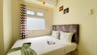 Good Choice and Restful 2BR Green Pramuka City Apartment near Mall By Travelio