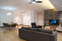 Homey and Spacious 3BR Grand Tropic Apartment By Travelio