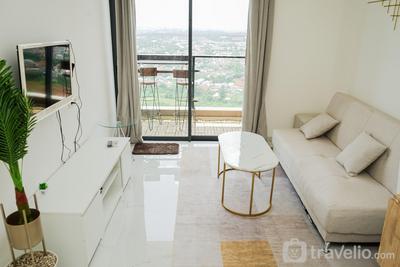 Elegant and Homey 2BR at Sky House BSD Apartment By Travelio