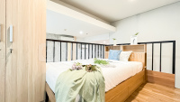 Elegant 2BR Loft Apartment with Private Lift at Yukata Suites By Travelio