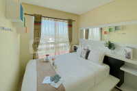 Comfy 2BR Apartment at Woodland Park Residence By Travelio