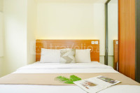 Compact and Comfy 2BR at Meikarta Apartment By Travelio