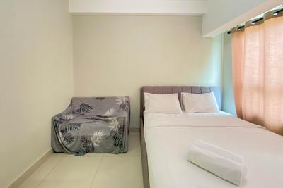 Pleasant and Tidy Studio Apartment Springlake Summarecon Bekasi Apartment By Travelio