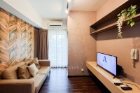 Classic and Warm 2BR at Apartment M-Town Residence By Travelio