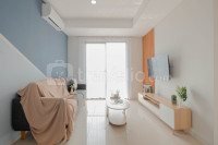 Spacious 3BR at Daan Mogot City Apartment By Travelio