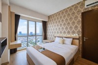 Homey and Simply 1BR M-Town Signature Apartment By Travelio