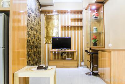 Comfortable and Fully Furnished 1BR Green Pramuka City Apartment By Travelio