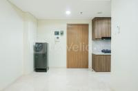 2BR Unfurnished at Puri Orchard Apartment with AC and Kitchen Set By Travelio