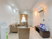 Spacious 2BR with Mall Access at Bellezza Apartment By Travelio