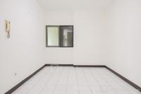 Unfurnished 1BR With AC at Kondominium Rajawali Apartment By Travelio