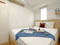 Spacious and Clean 3BR Bassura City Apartment By Travelio