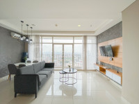 Spacious and Comfy 3BR Ciputra International Apartment By Travelio