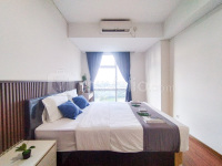 Simple 1BR near Mall at Grand Sungkono Lagoon Apartment By Travelio