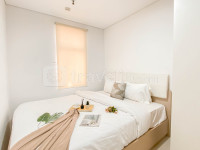 Ivory Nest 1BR at Vittoria Residence Apartment By Travelio