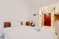 Warm Studio at 38th Floor Sky House Alam Sutera Apartment By Travelio