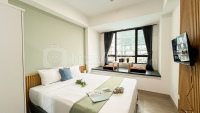 Ivory Studio at Collins Boulevard Apartment By Travelio