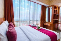 Cozy and Minimalist Space 2BR at Tamansari Papilio Apartment By Travelio