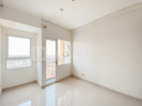 Apartemen Grand Icon Caman - Unfurnished Studio Room at Grand Icon Caman Apartment By Travelio