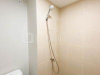 Apartemen Meikarta - New Unfurnished Studio with AC at 2nd Floor Meikarta Apartment By Travelio