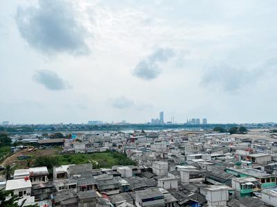 Apartemen Pluit Sea View - Restful and Minimalist 2BR Pluit Sea View Apartment By Travelio