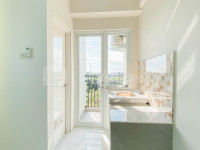 Apartemen Royal Garden  - Unfurnished Studio Room with AC at Royal Garden Apartment By Travelio