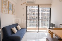 Comfy and Minimalist 2BR Apartment Sky House BSD By Travelio