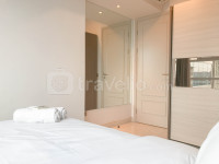 Apartemen One Icon Residence - Minimalist 3BR Apartment Connecting to Tunjungan Plaza at One Icon Residence By Travelio