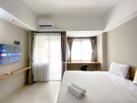 Cozy and Minimaist Studio LRT City Jatibening Apartment By Travelio