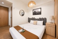 Apartemen Cisauk Point - Warm Wooden Touch Studio Room at Apartment Cisauk Point By Travelio