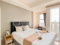 Basic Style Studio at Apartment Belmont Residence Puri By Travelio