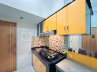 Apartemen Puncak Permai - 2BR near Lenmarc Mall at Puncak Permai Apartment By Travelio