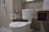 Apartemen Grande Valore Condominium - Wonderful and Pool View 1BR Apartment Grande Valore Condominium By Travelio
