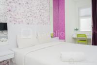 Homey Studio Apartment with Pool View at Springwood Residence By Travelio