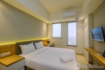 Fully Furnished with Modern Design Studio at Evenciio Margonda Apartment By Travelio