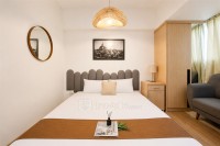 Apartemen Cisauk Point - Warm Wooden Touch Studio Room at Apartment Cisauk Point By Travelio