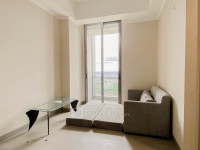 Apartemen Menara Jakarta Kemayoran - Unfurnished 2BR with AC and Maid Room Menara Jakarta Kemayoran Apartment By Travelio