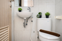 Apartemen Monroe Tower - Wooden Accents Studio at Monroe Tower Apartment By Travelio