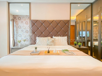 Modern and Spacious 2BR Apartment Green Bay Condominium By Travelio