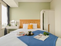 Basic Style and Homey 2BR at Apartment Nifarro Park By Travelio